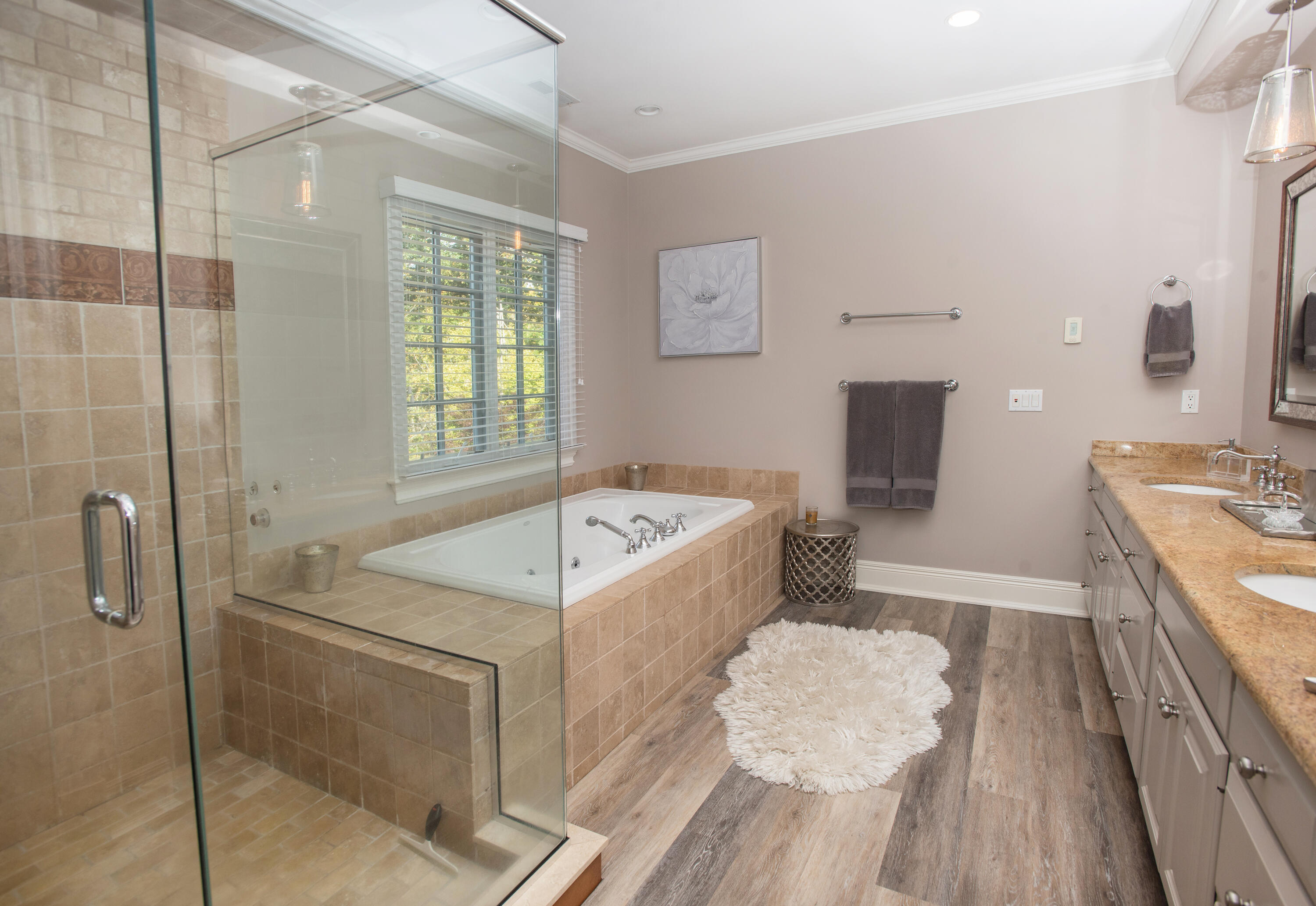60 Bowery Road New Canaan, CT 06840 - Photo 18 of 49 a bathroom with a tub sink and mirror