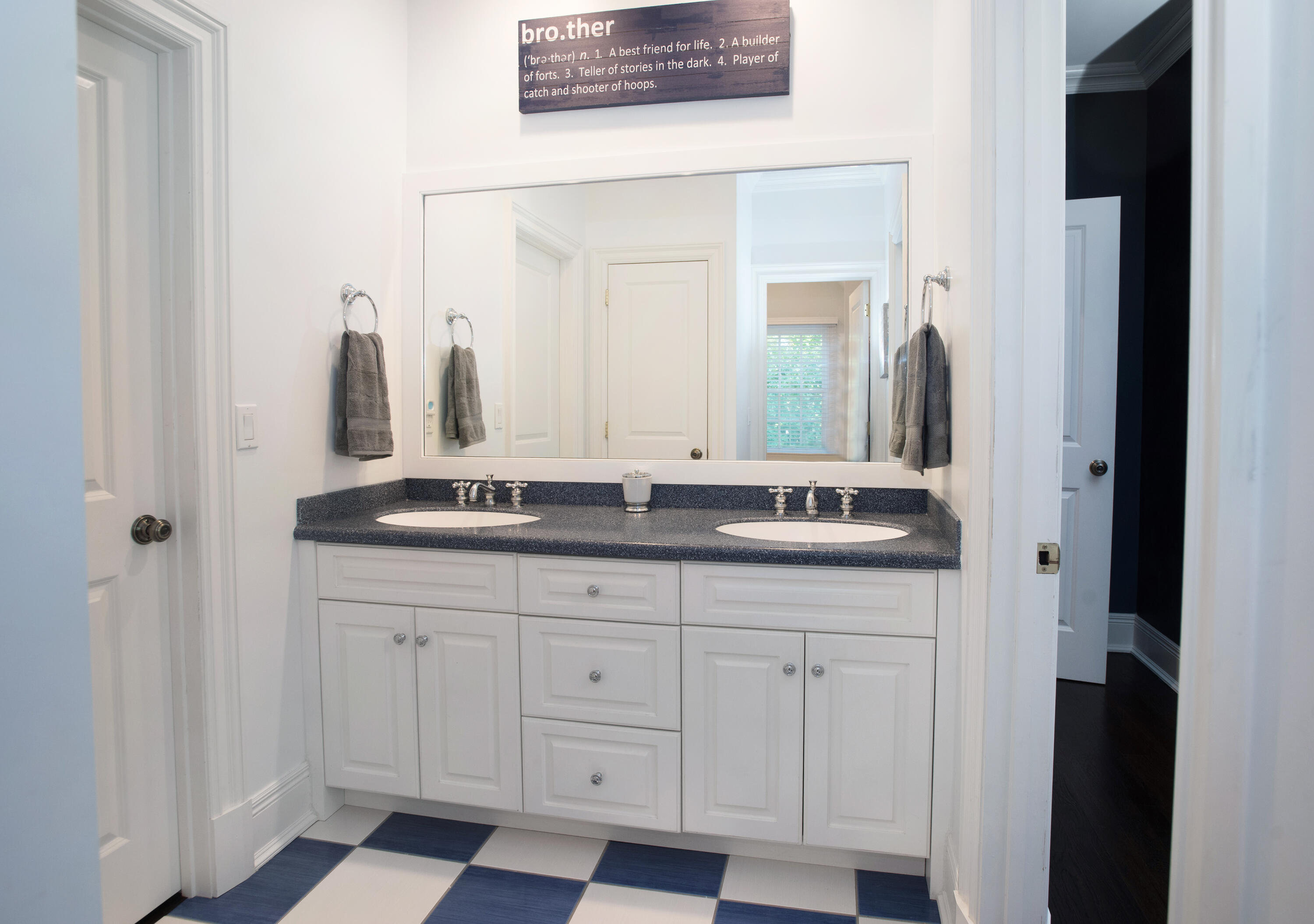 60 Bowery Road New Canaan, CT 06840 - Photo 25 of 49 a bathroom with a sink and a mirror