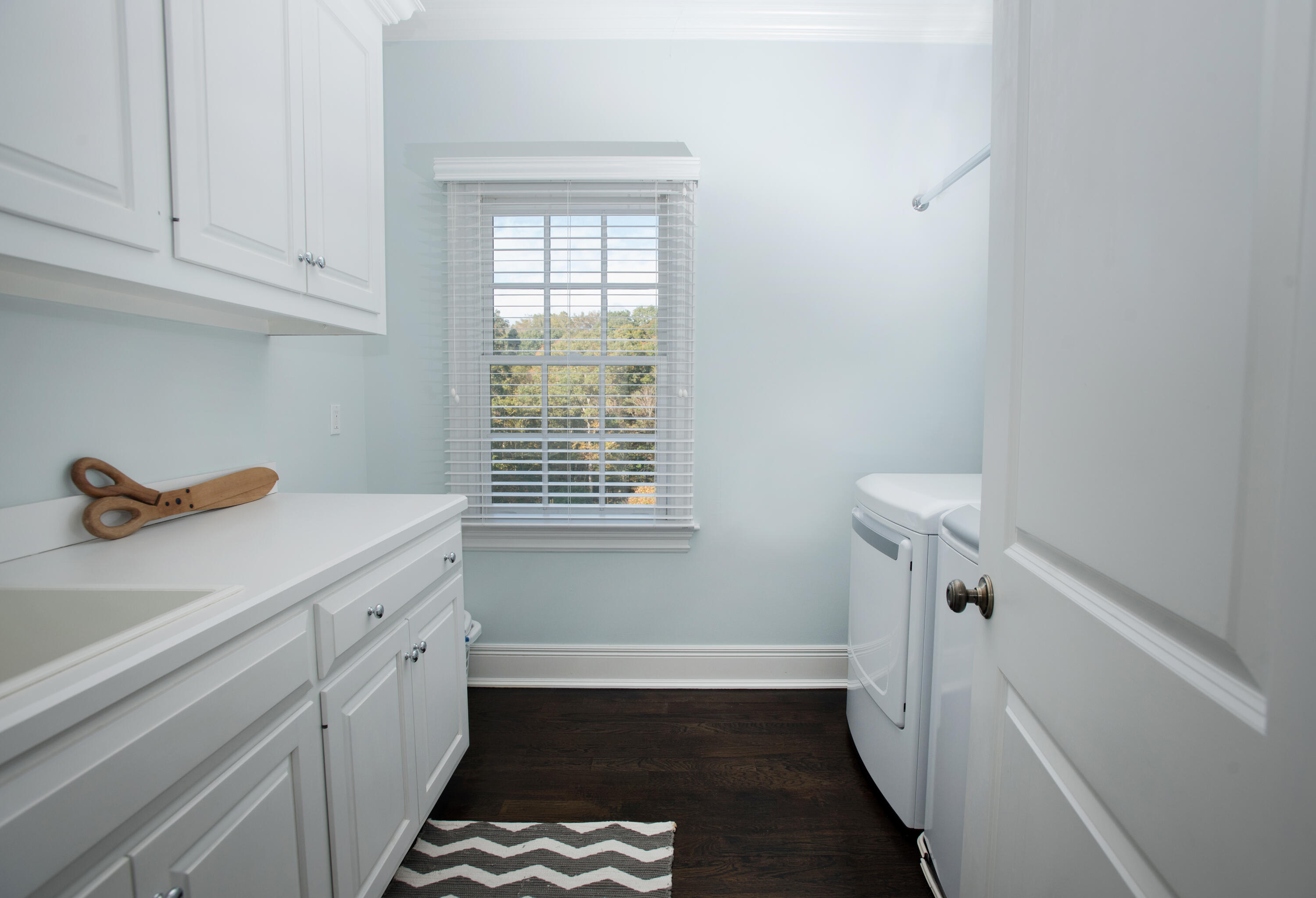 60 Bowery Road New Canaan, CT 06840 - Photo 30 of 49 a utility room with a window dryer and washer
