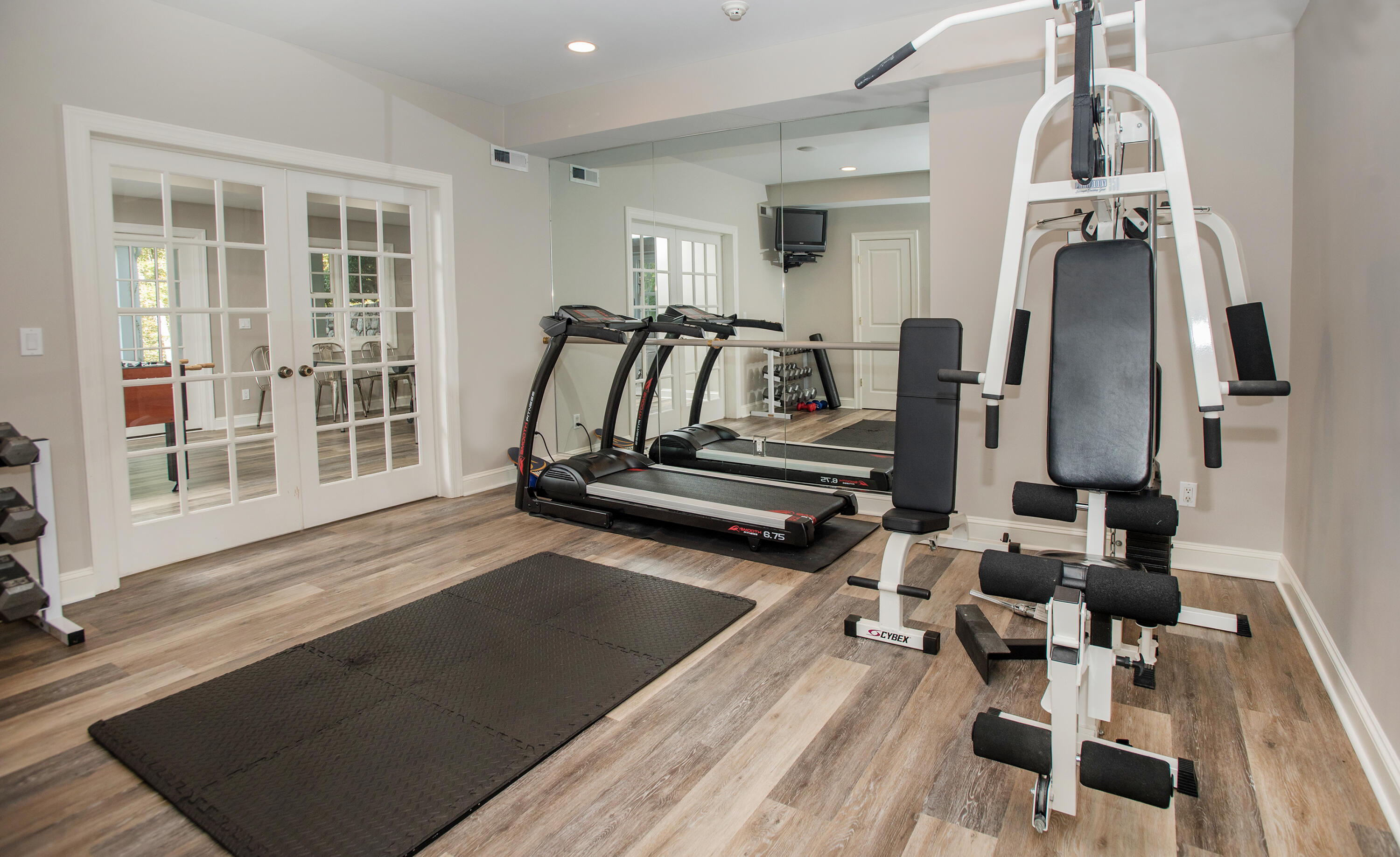 60 Bowery Road New Canaan, CT 06840 - Photo 34 of 49 a view of a room with gym equipment