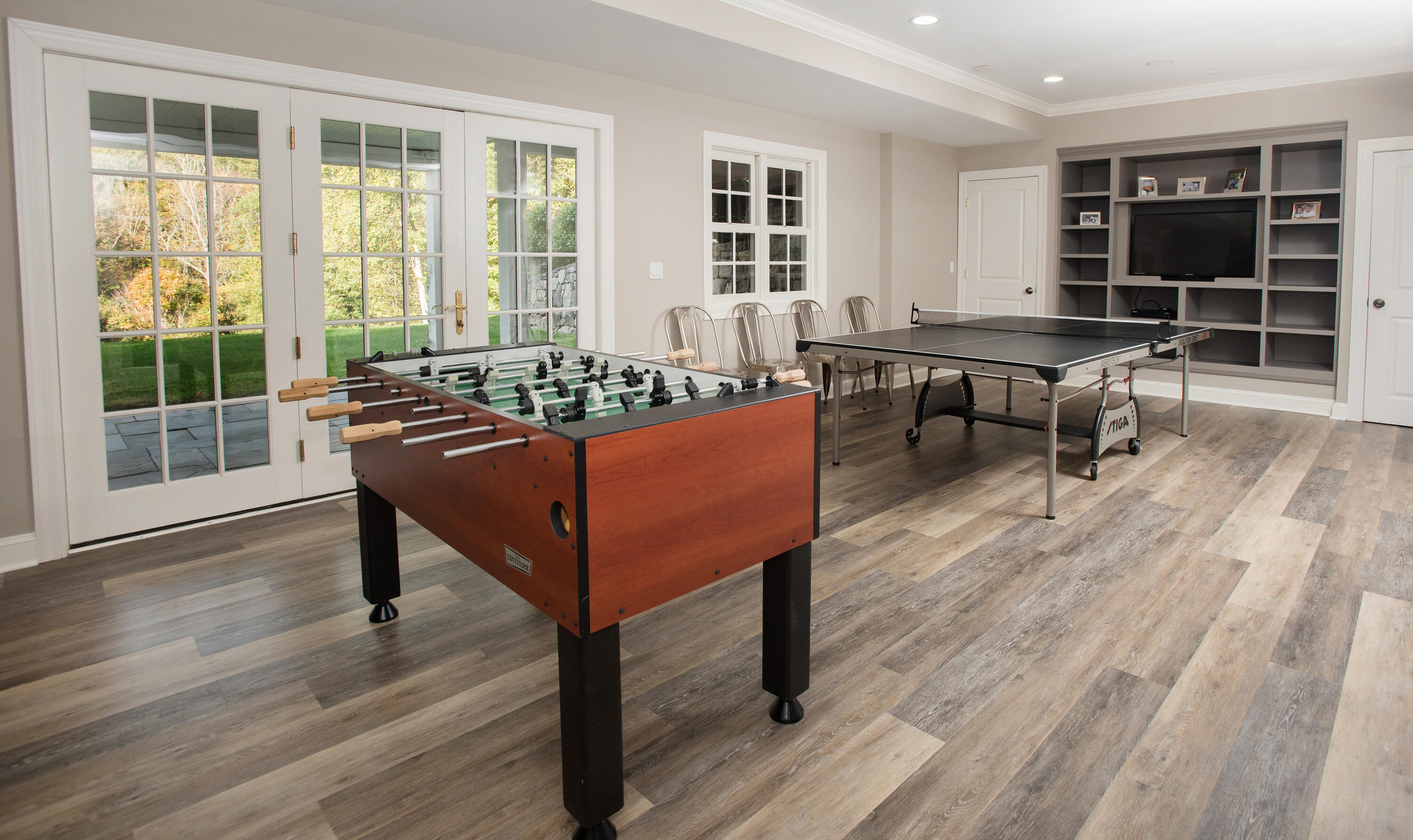 60 Bowery Road New Canaan, CT 06840 - Photo 35 of 49 a living room with furniture and large windows