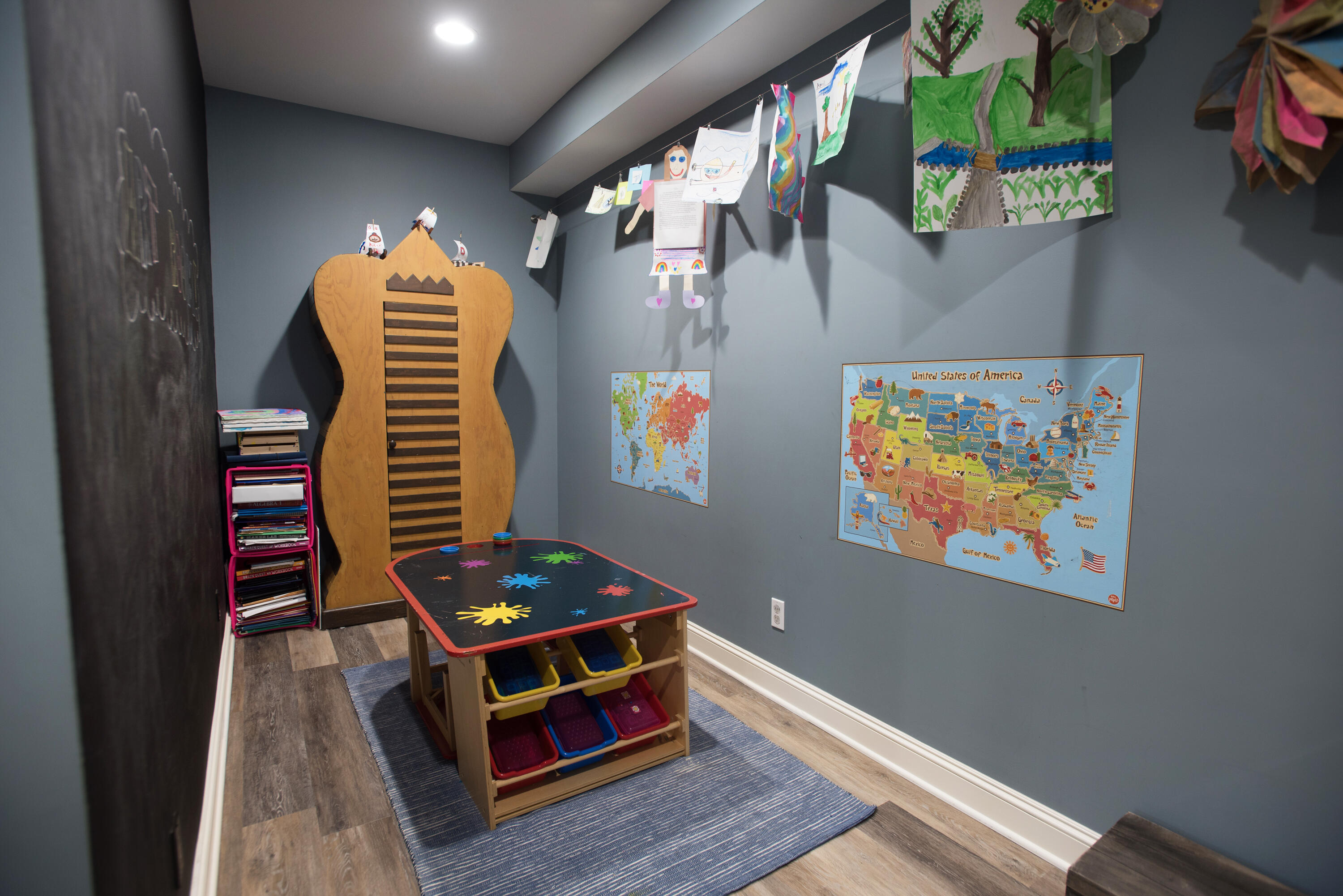 60 Bowery Road New Canaan, CT 06840 - Photo 36 of 49 a room with wooden floor and musical instruments