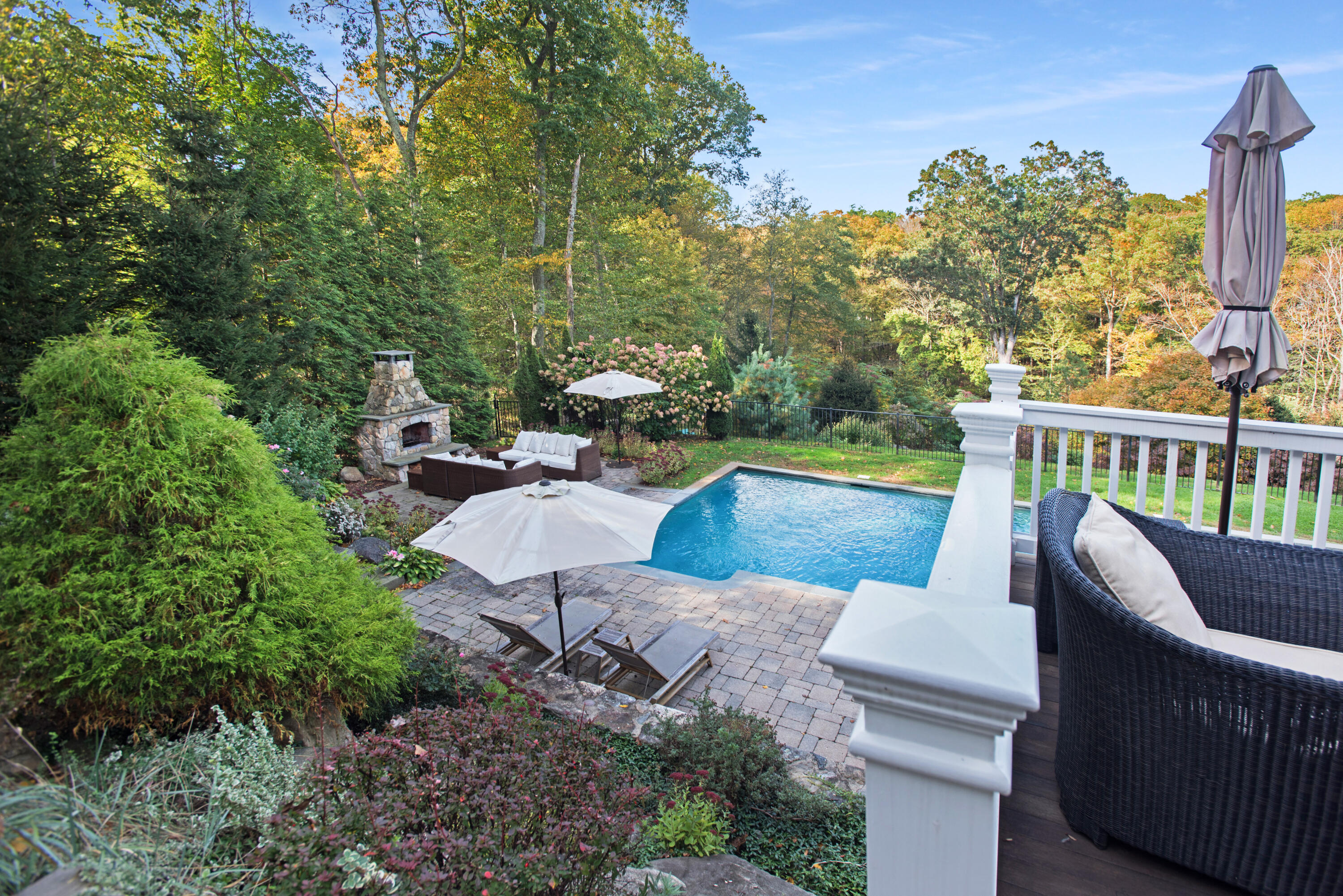 60 Bowery Road New Canaan, CT 06840 - Photo 45 of 49 a view of a patio with couches chairs and potted plants