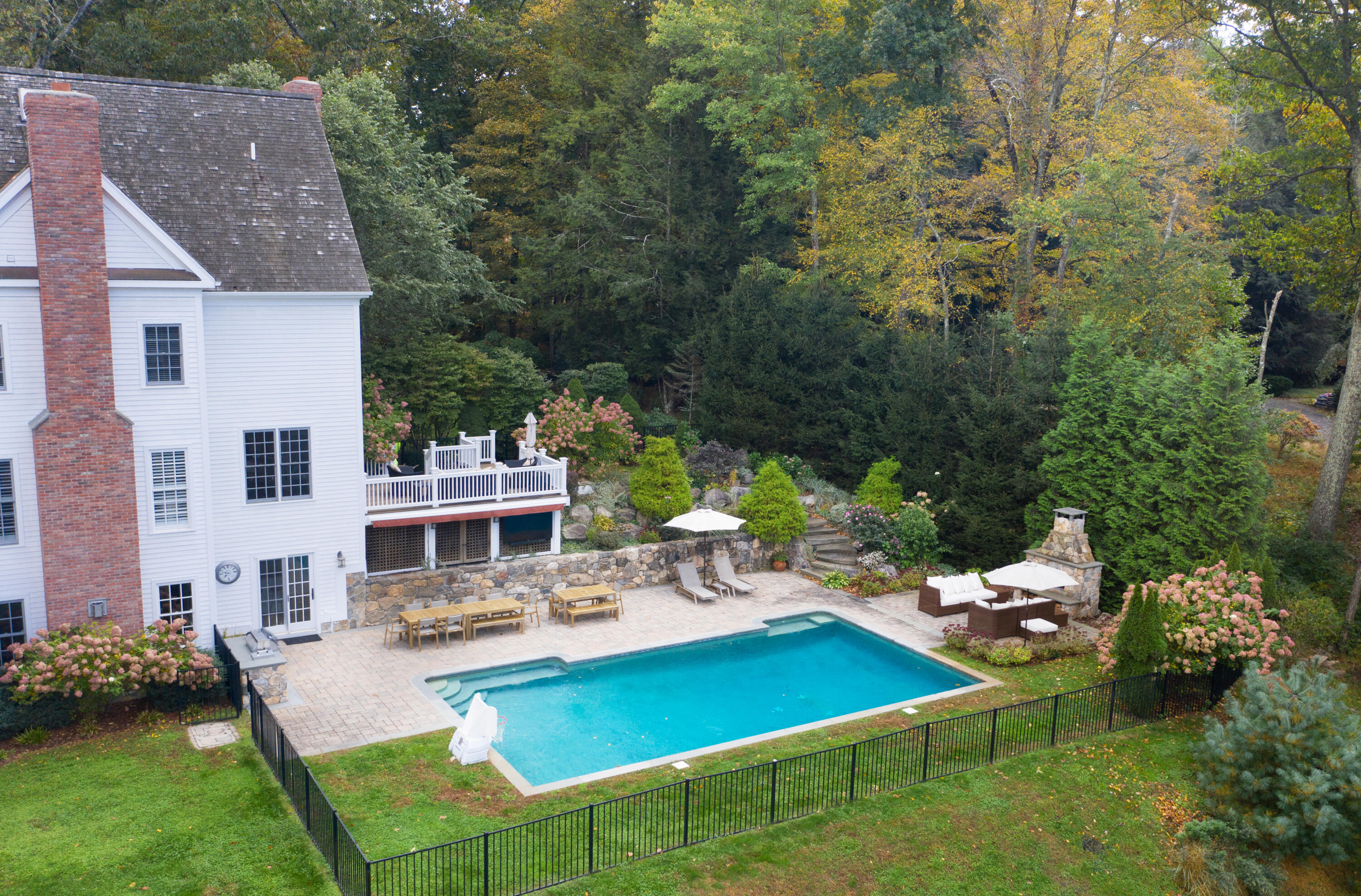 60 Bowery Road New Canaan, CT 06840 - Photo 47 of 49 an aerial view of a house with swimming pool garden and patio