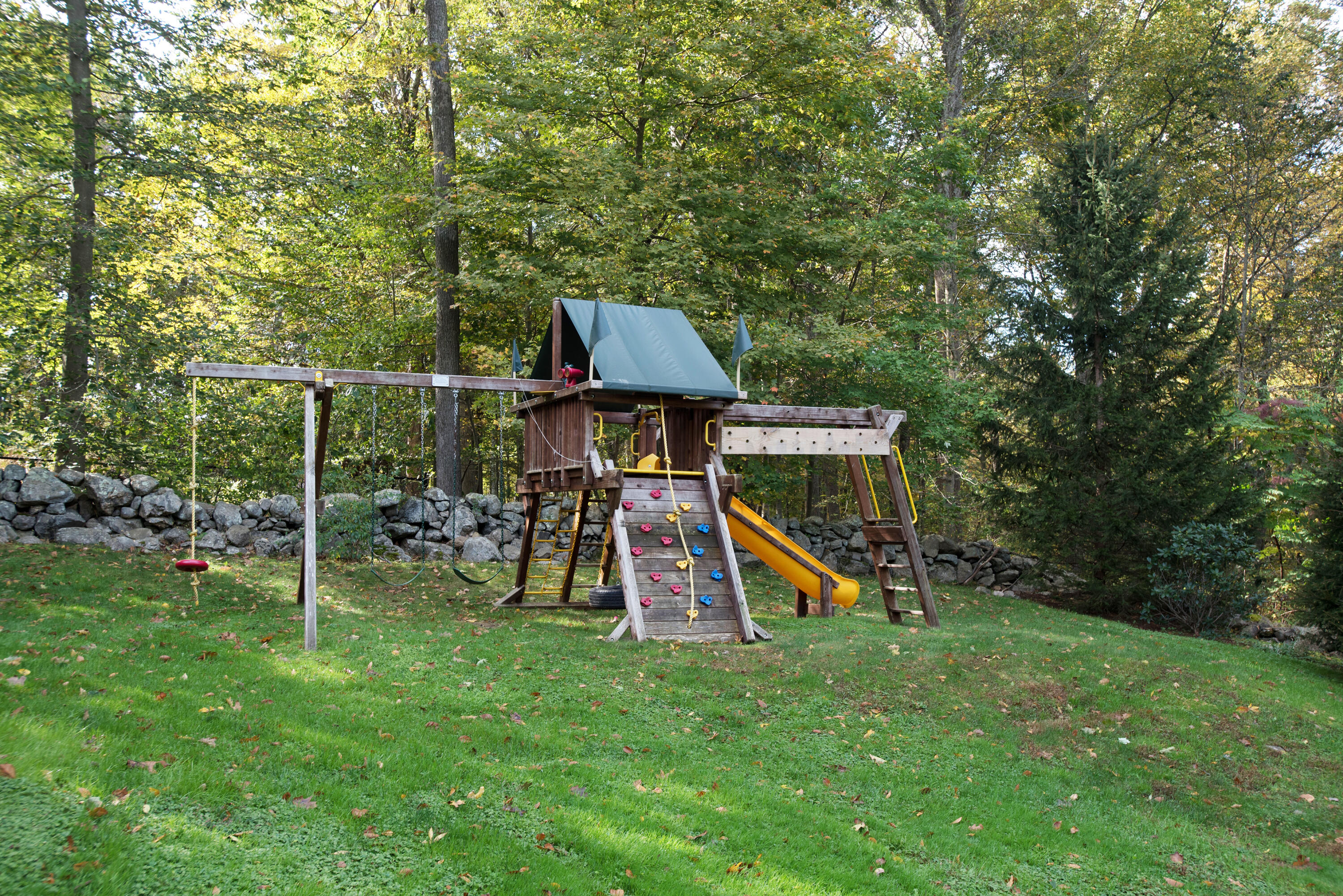 60 Bowery Road New Canaan, CT 06840 - Photo 49 of 49 a view of a wooden deck and a yard