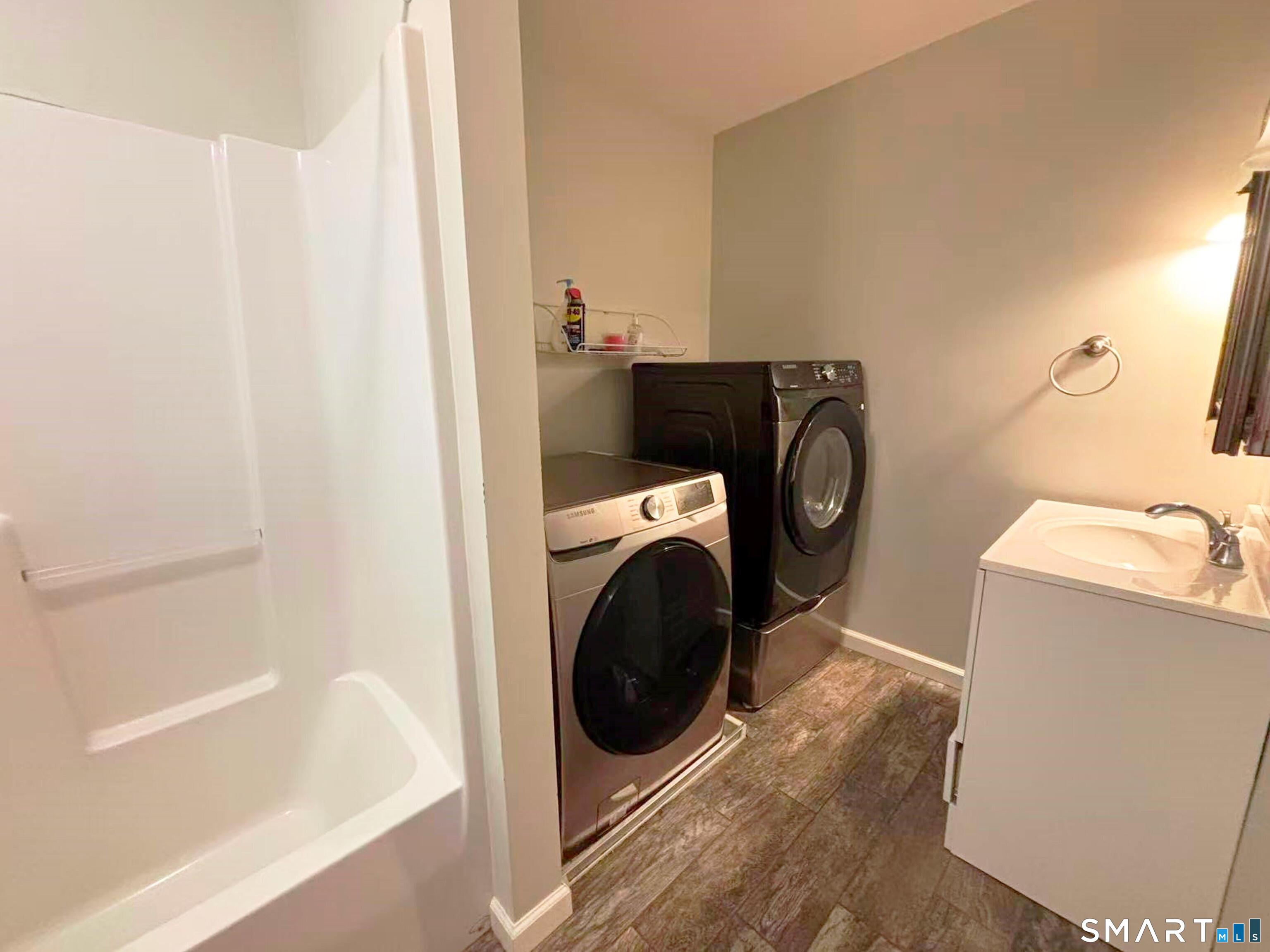 52 Monce Road Burlington, CT 06013 - Photo 16 of 26 a utility room with dryer and washer