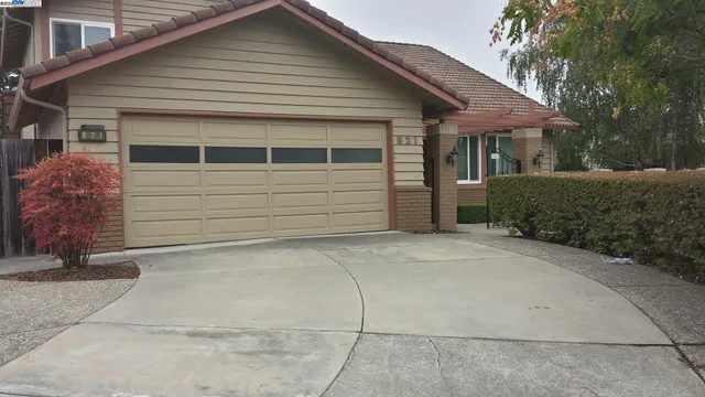 a front view of a house with a garage