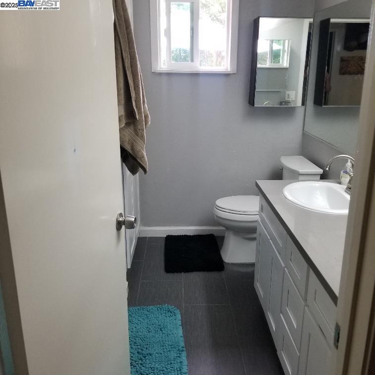 Danville Place Danville, CA 94526 - Photo 12 of 26 a bathroom with a sink a toilet and a mirror