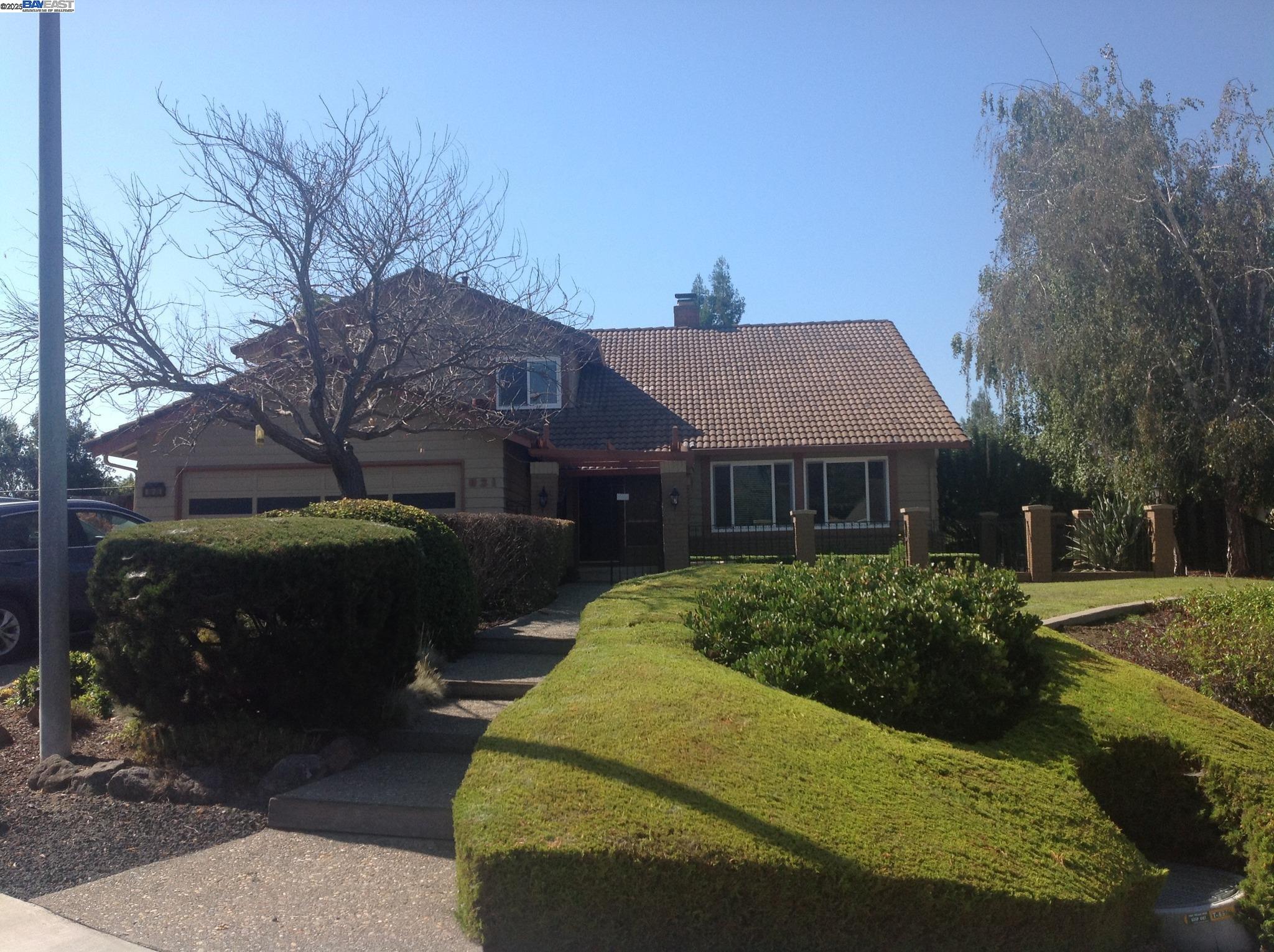 Danville Place Danville, CA 94526 - Photo 25 of 26 a front view of a house with a garden
