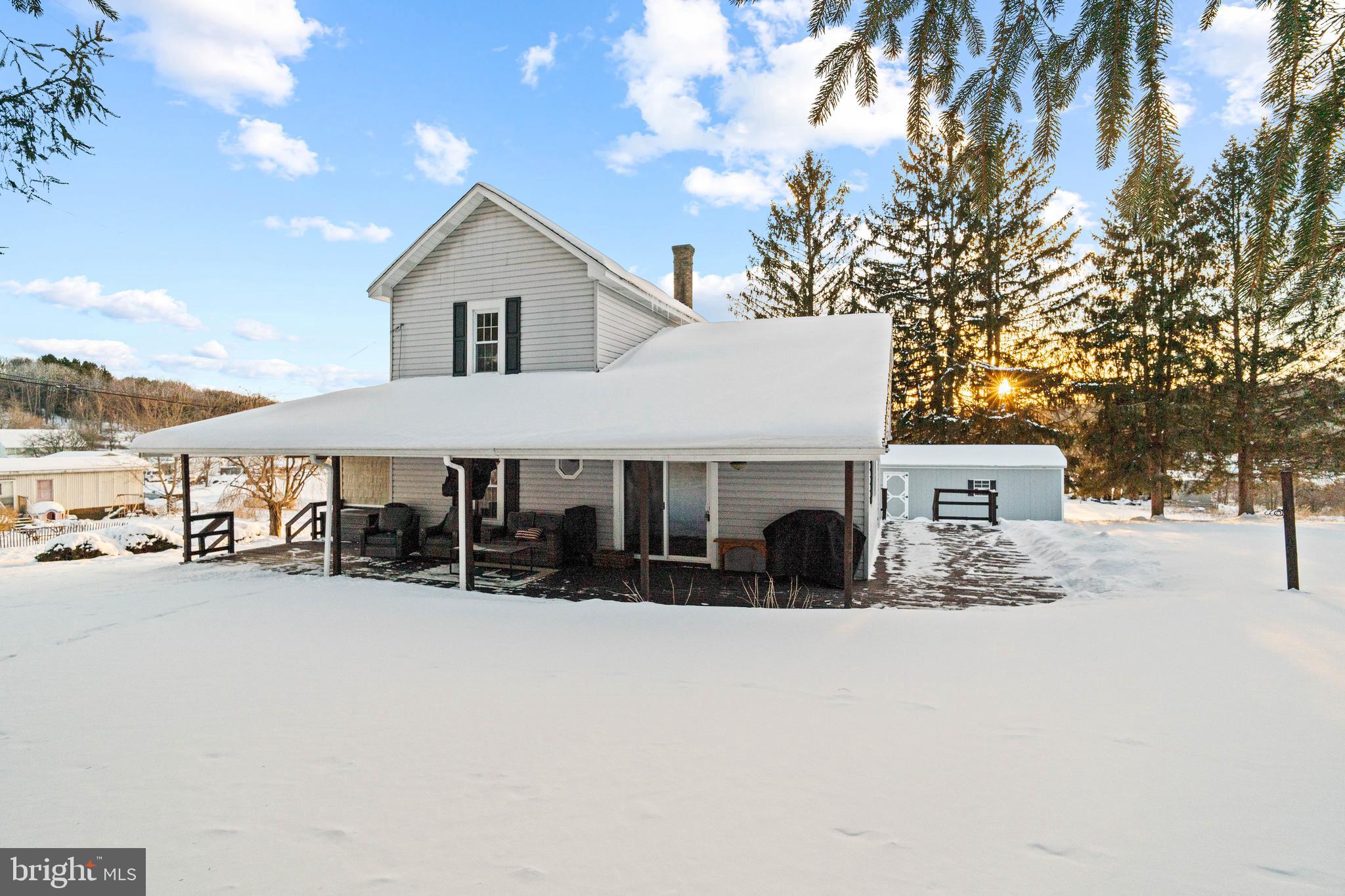 197 Ridge Street Smokerun, PA 16681 - Photo 40 of 47 a view of a house with a yard covered in snow