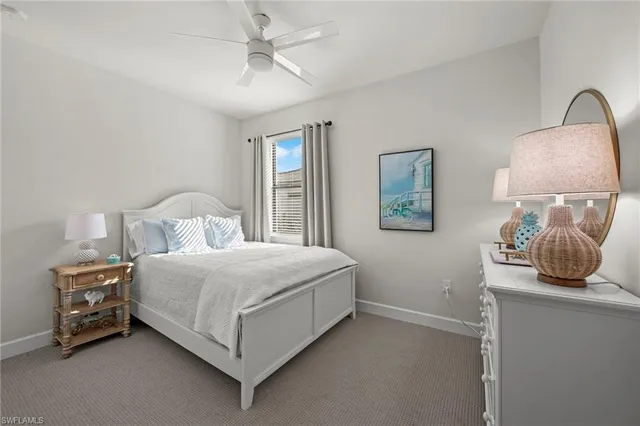 a view of a hallway with bathroom and bathroom