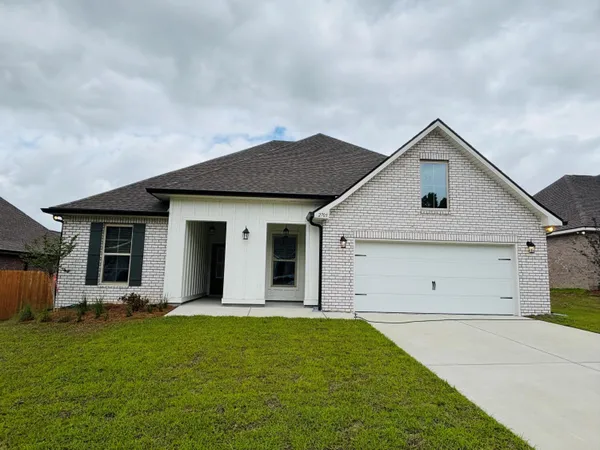 a front view of house with yard