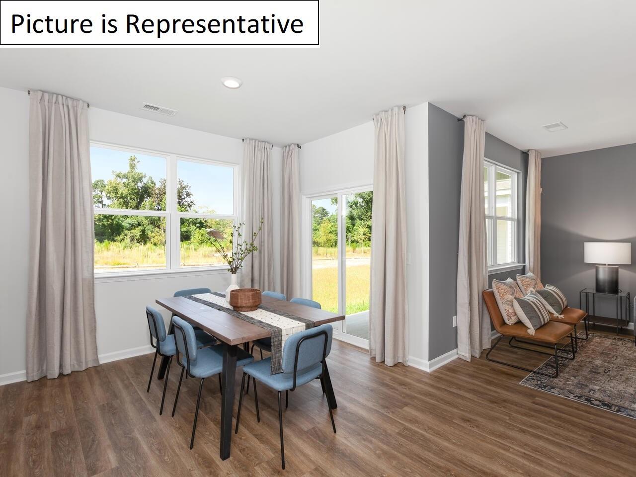 1120 Secrest Cmns Drive Monroe, NC 28112 - Photo 13 of 25 a view of a dining room with furniture window and outside view