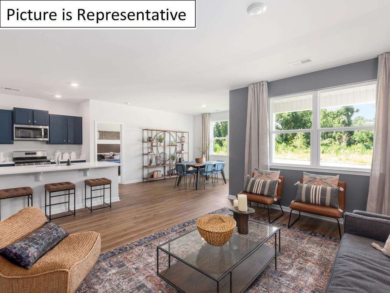 1120 Secrest Cmns Drive Monroe, NC 28112 - Photo 15 of 25 a living room with furniture and a large window