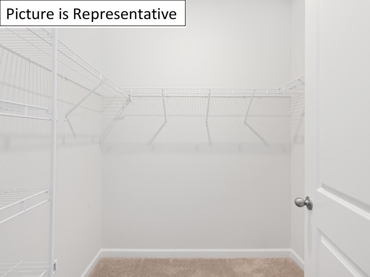 1120 Secrest Cmns Drive Monroe, NC 28112 - Photo 21 of 25 a view of small space with racks on the wall