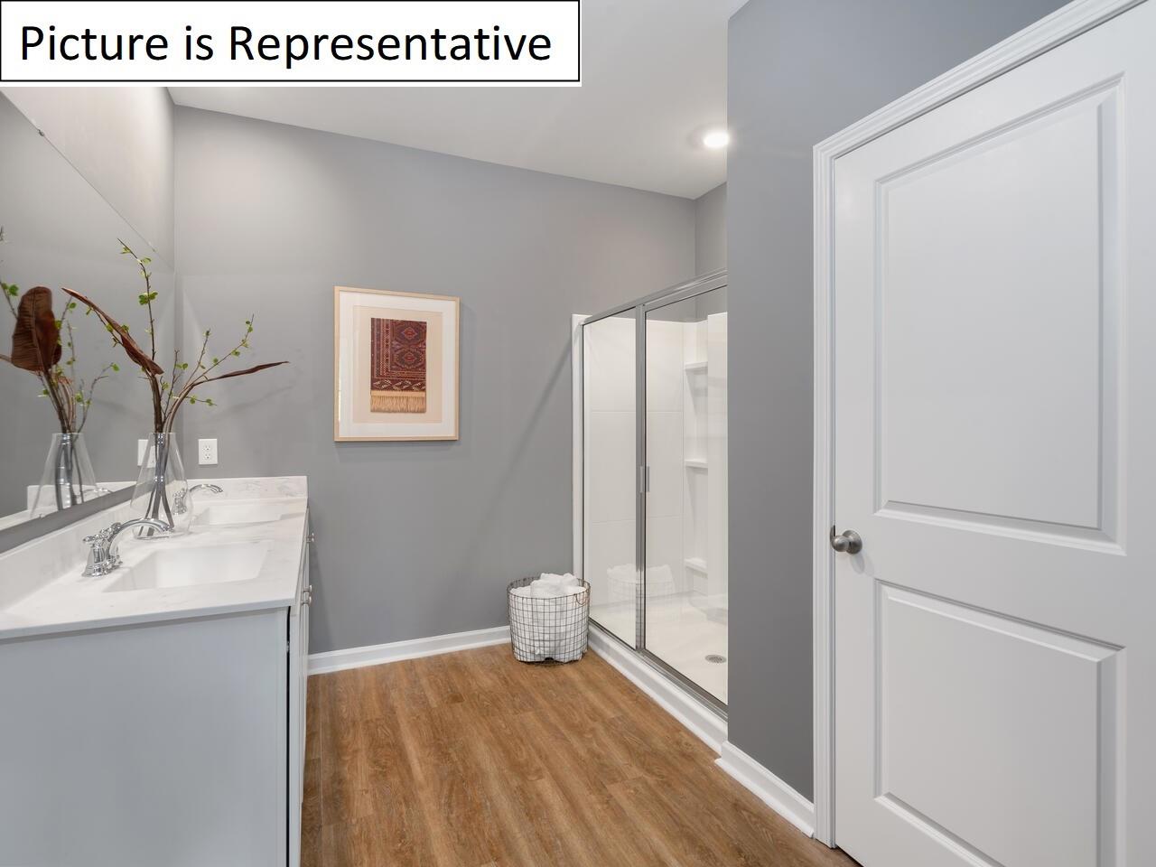 1120 Secrest Cmns Drive Monroe, NC 28112 - Photo 22 of 25 a bathroom with a sink and a mirror