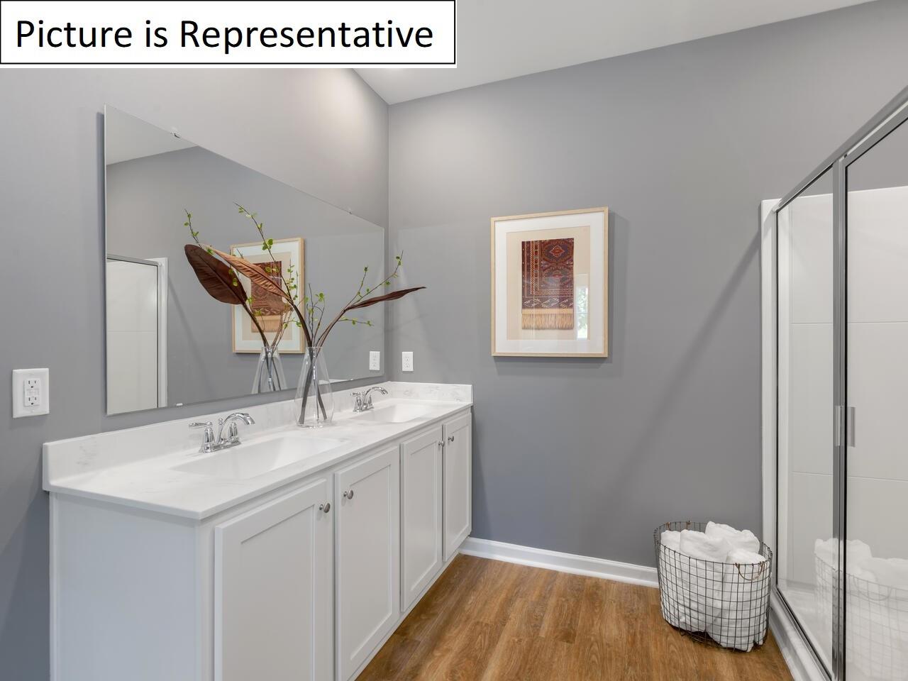 1120 Secrest Cmns Drive Monroe, NC 28112 - Photo 23 of 25 a bathroom with a sink and a mirror
