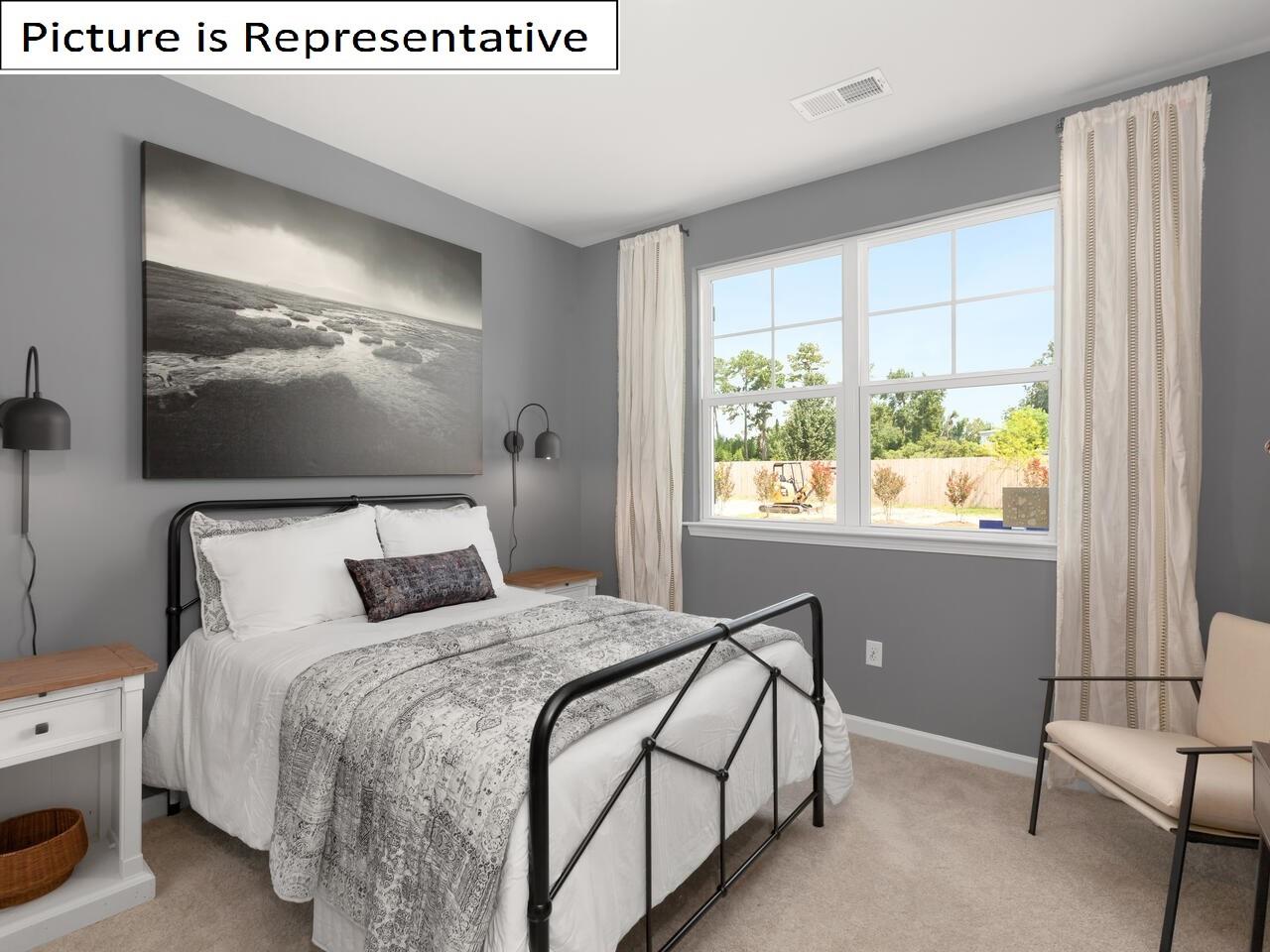 1120 Secrest Cmns Drive Monroe, NC 28112 - Photo 5 of 25 a bedroom with a bed and a window