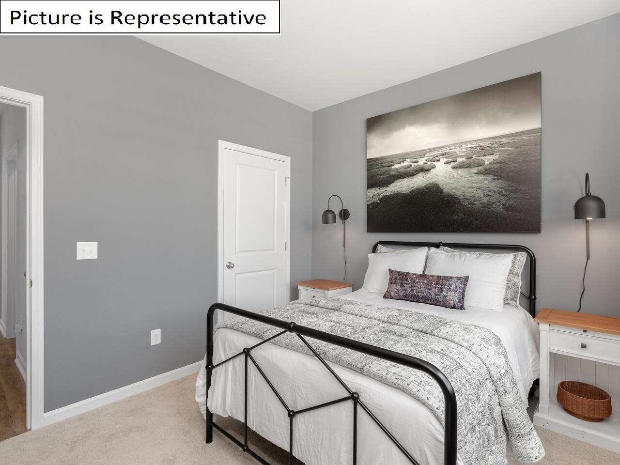 1120 Secrest Cmns Drive Monroe, NC 28112 - Photo 6 of 25 a bedroom with a bed and a flat screen tv