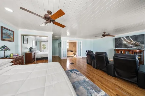 a living room with furniture a rug and a fireplace