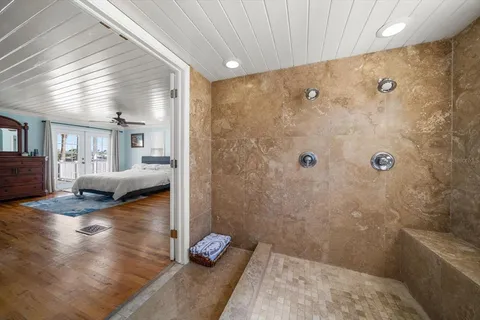 a bathroom with a sink and shower