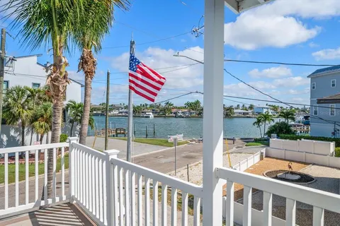 a view of a balcony with lake view