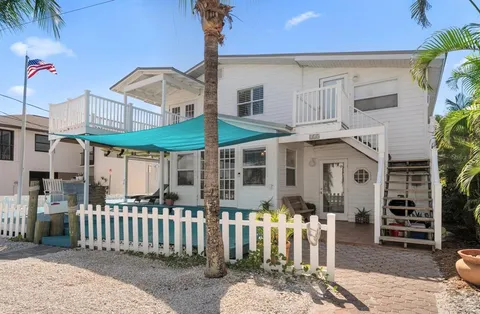 a front view of a house with a porch
