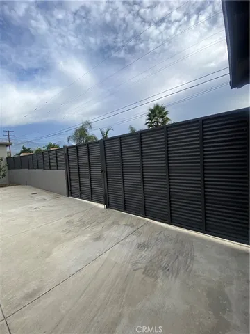 a view of a garden with a houses