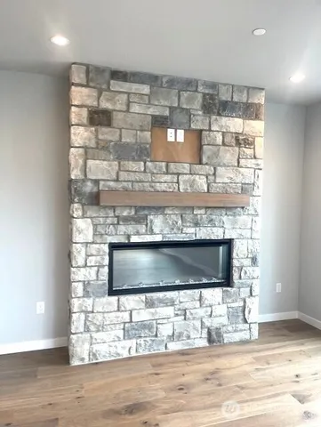 a stove top oven sitting inside of a kitchen