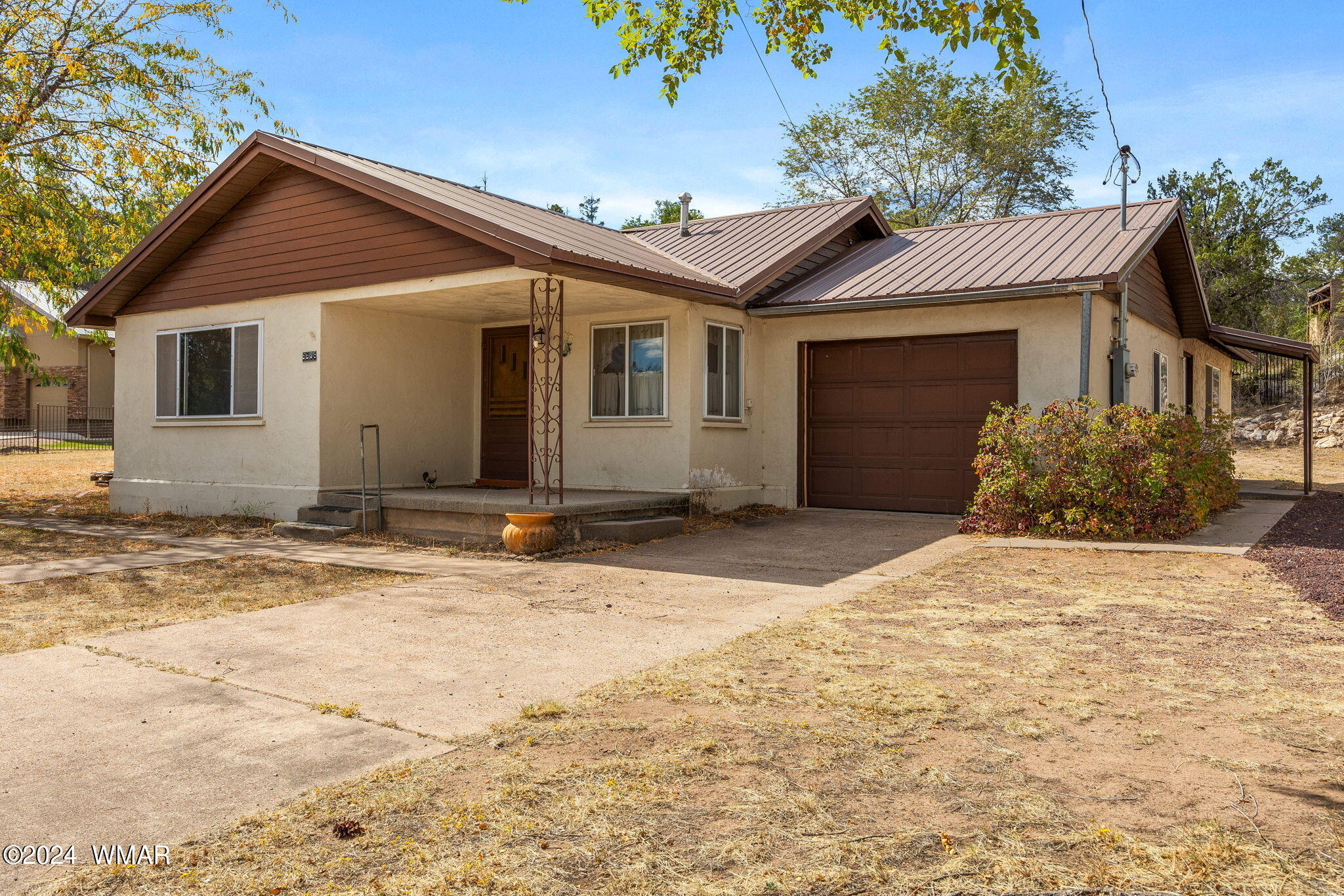 3368 Buckskin Canyon Road Heber, AZ 85928 - Photo 1 of 48 a front view of a house with a yard