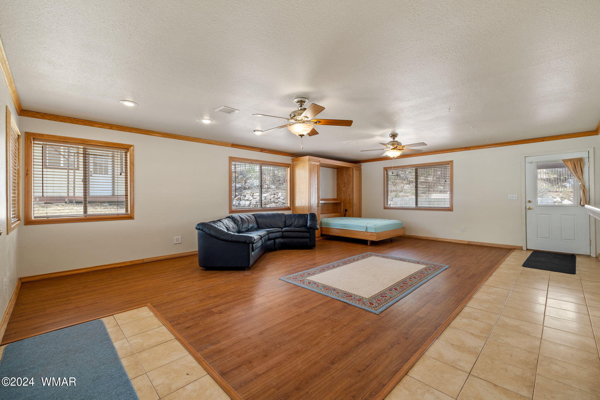 3368 Buckskin Canyon Road Heber, AZ 85928 - Photo 16 of 48 a living room with furniture and a window