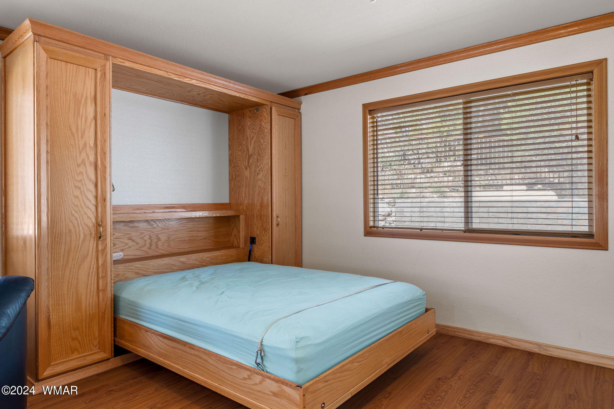 3368 Buckskin Canyon Road Heber, AZ 85928 - Photo 17 of 48 a bedroom with a bed and a window