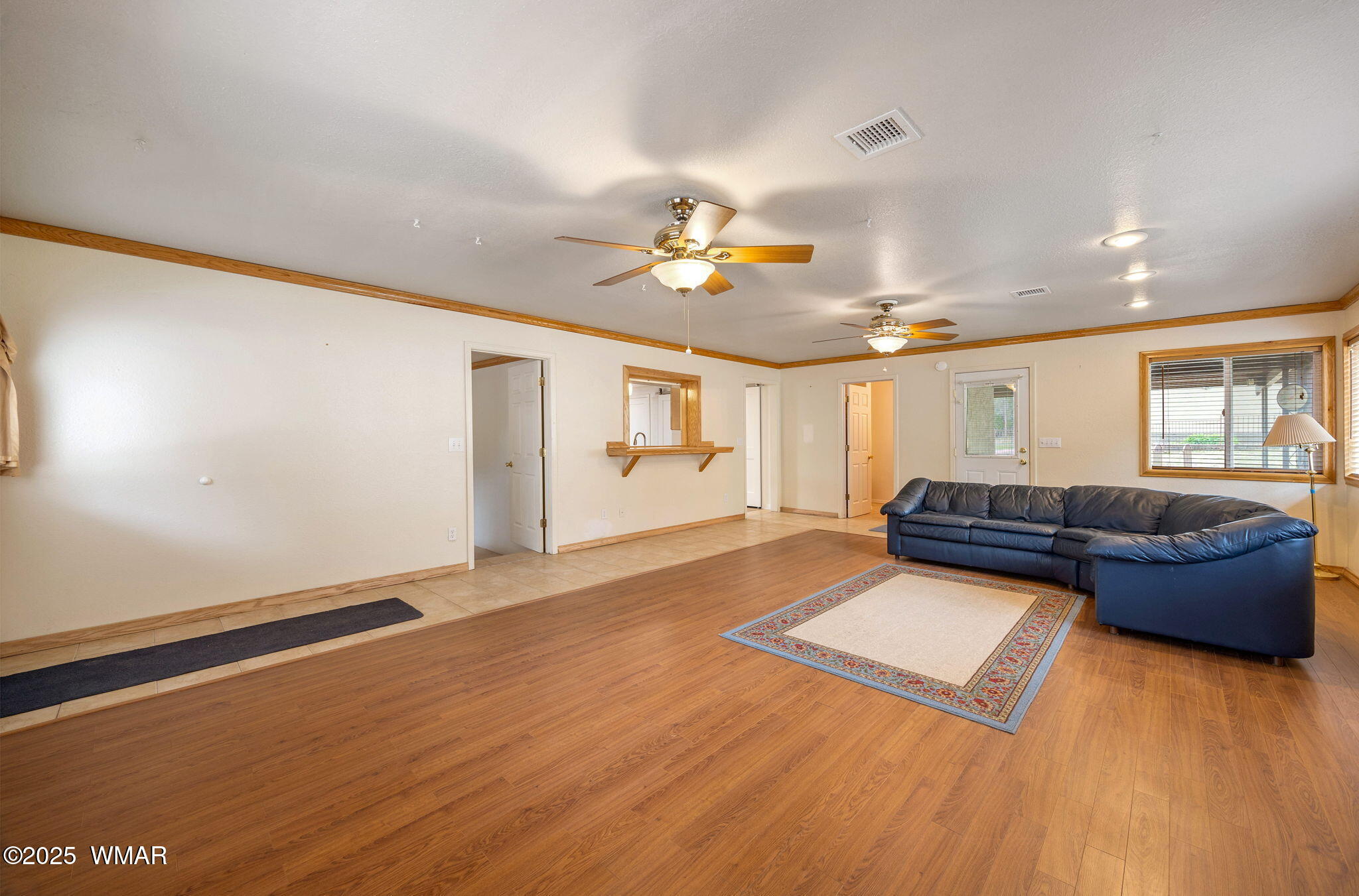 3368 Buckskin Canyon Road Heber, AZ 85928 - Photo 42 of 48 a living room with furniture and wooden floor