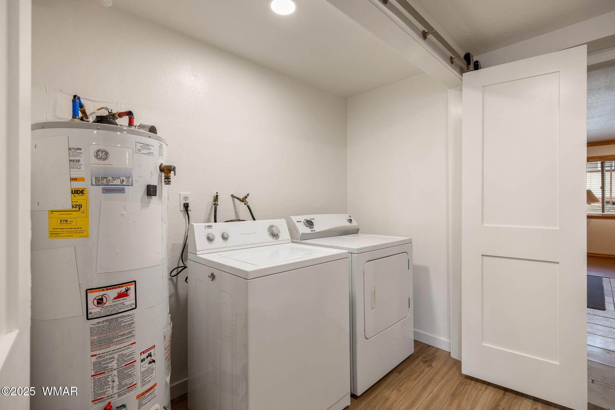 3368 Buckskin Canyon Road Heber, AZ 85928 - Photo 47 of 48 a utility room with dryer and washer