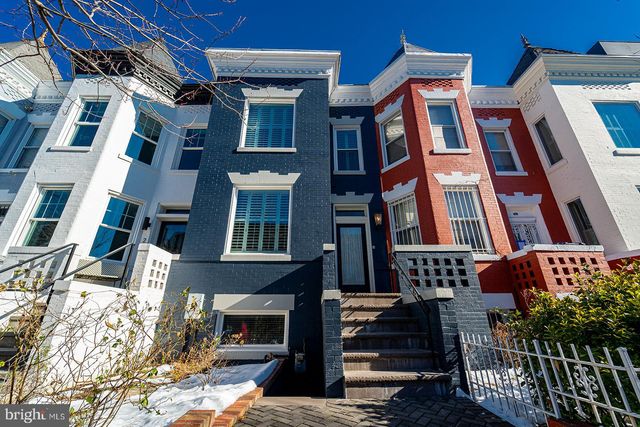 a front view of a multi story building