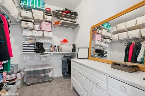 a utility room with cabinets and appliances