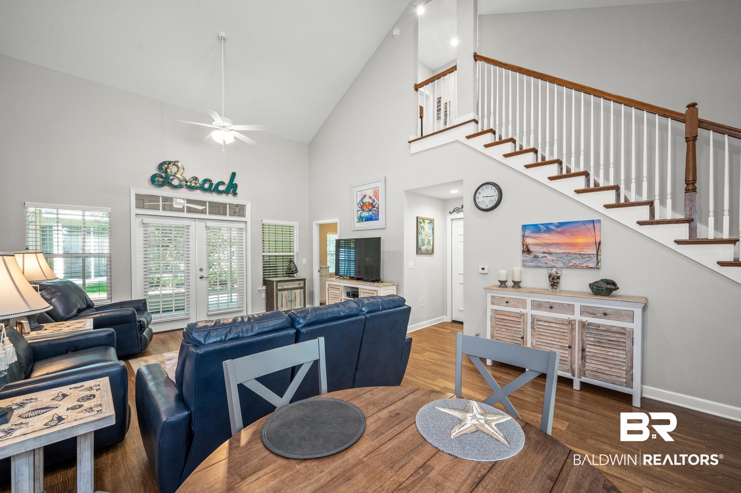 430 West Fort Morgan Road, Unit 1902 Gulf Shores, AL 36542 - Photo 9 of 59 Dining area featuring wood-type flooring, french doors, high vaulted ceiling, and ceiling fan