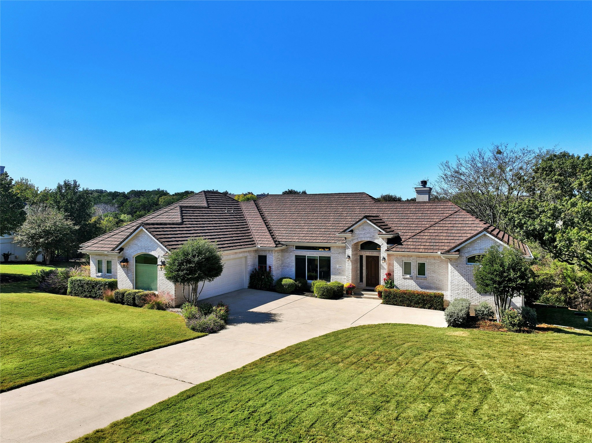 209 Overlook Court Georgetown, TX 78628 - Photo 2 of 34 Beautiful front elevation with Class 4 impact resistant metal roof