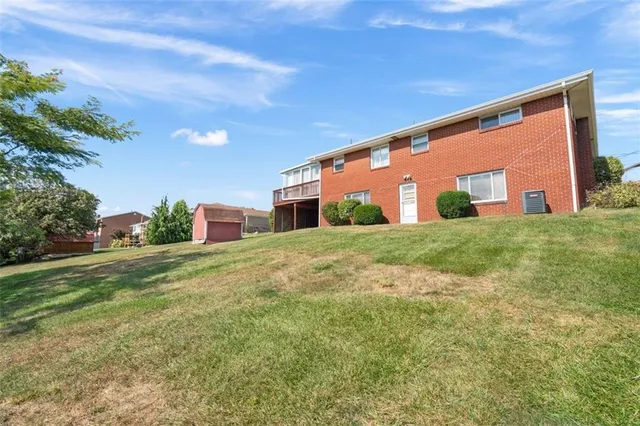 a front view of house with yard