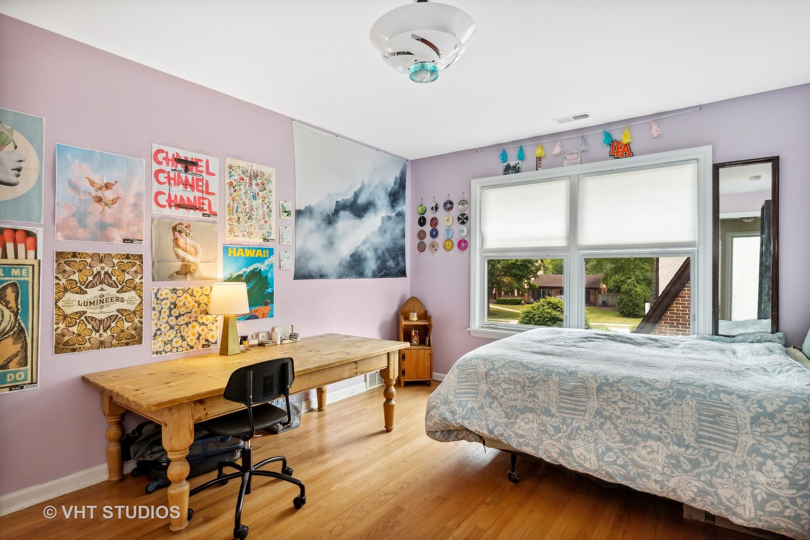 851 Warrington Road Deerfield, IL 60015 - Photo 18 of 25 a bedroom with a bed and a large window
