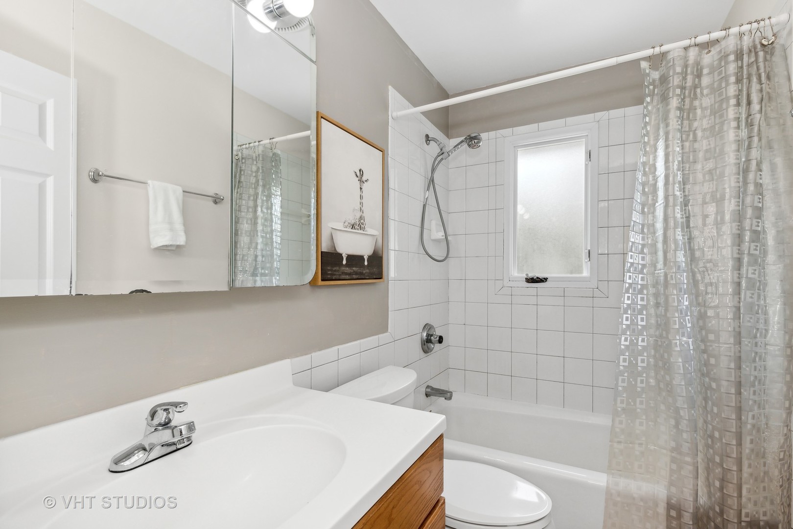 851 Warrington Road Deerfield, IL 60015 - Photo 19 of 25 a bathroom with a sink a toilet and shower