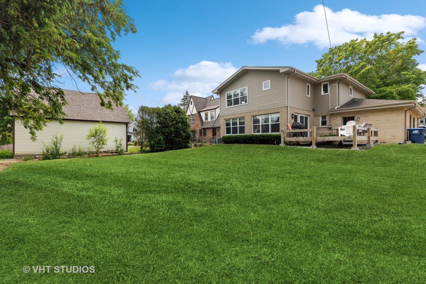 851 Warrington Road Deerfield, IL 60015 - Photo 21 of 25 a view of a house with a big yard and large trees