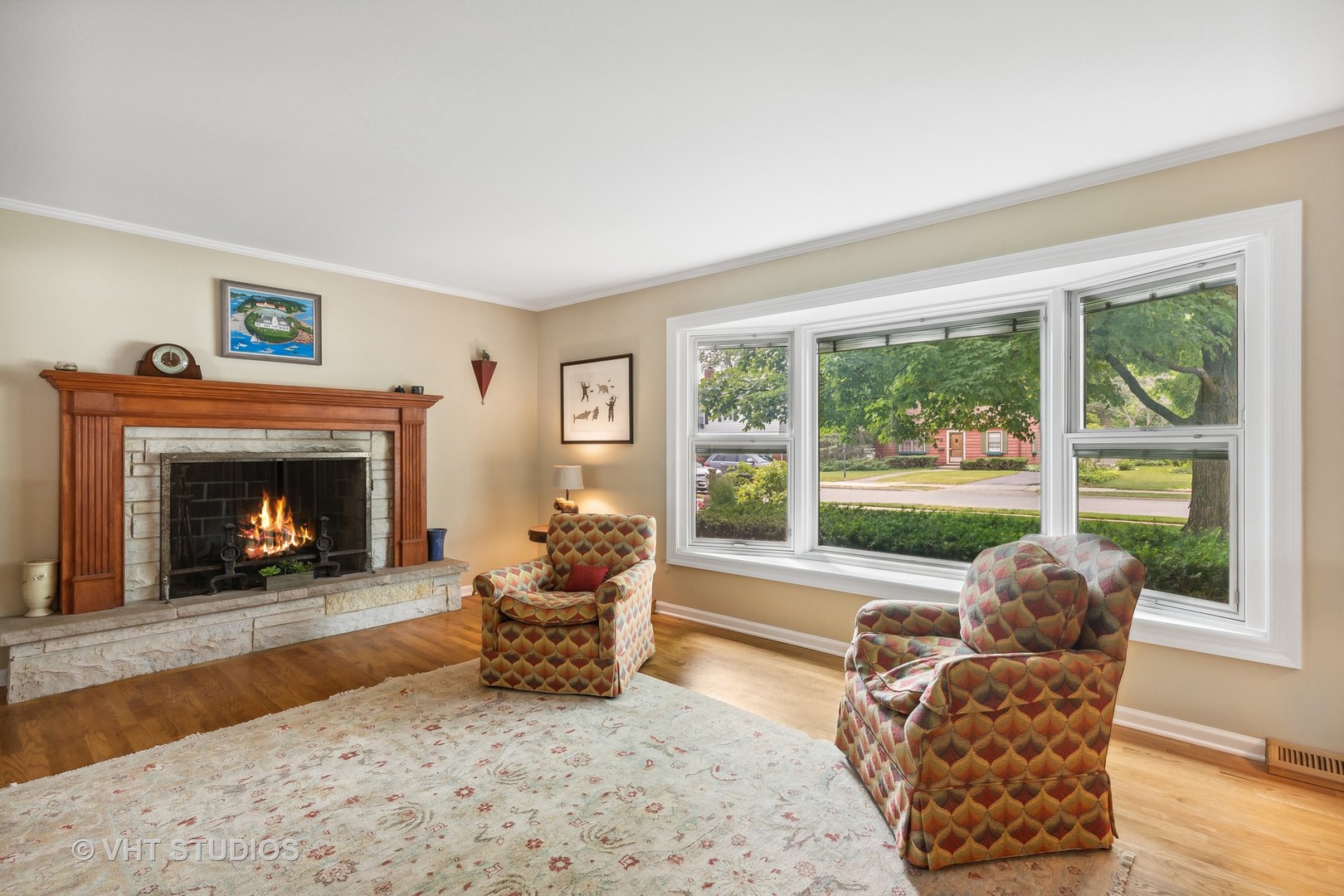 851 Warrington Road Deerfield, IL 60015 - Photo 4 of 25 a living room with furniture and a fireplace