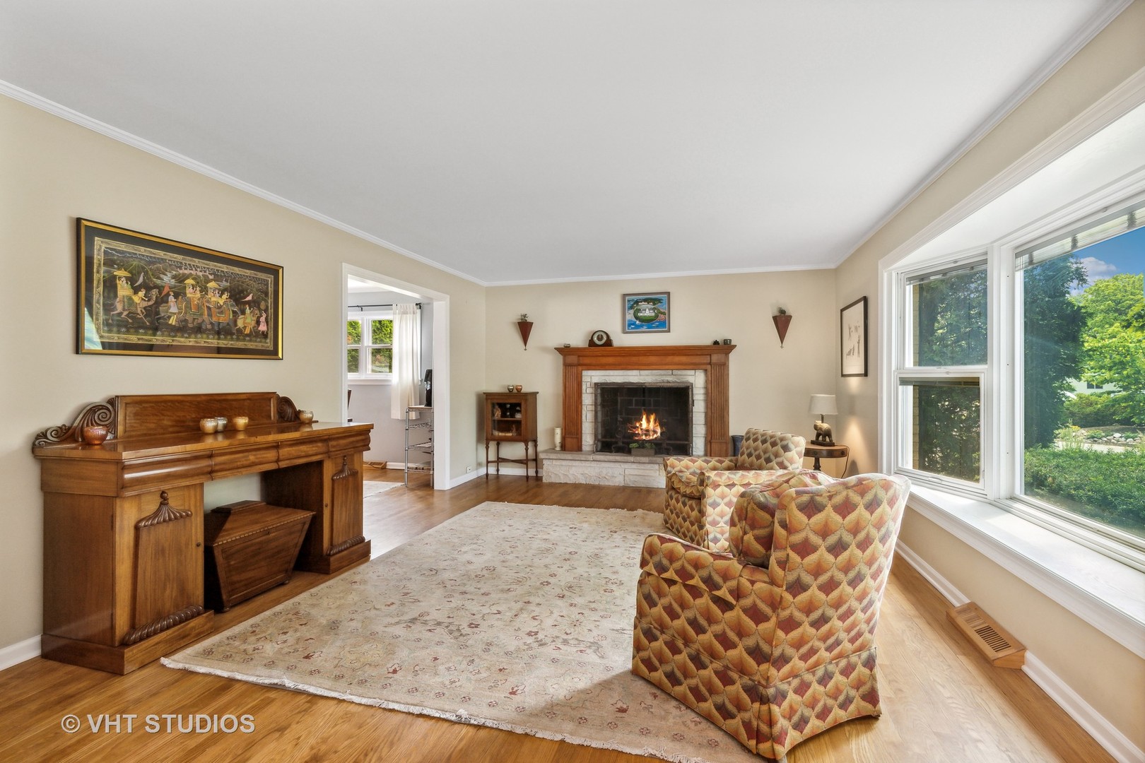 851 Warrington Road Deerfield, IL 60015 - Photo 8 of 25 a living room with furniture and a fireplace