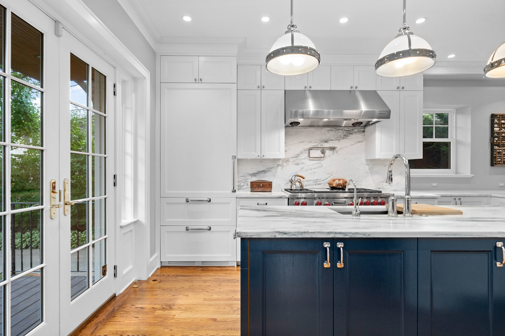 732 Sheridan Road Evanston, IL 60202 - Photo 14 of 46 a kitchen with kitchen island a sink stainless steel appliances and cabinets