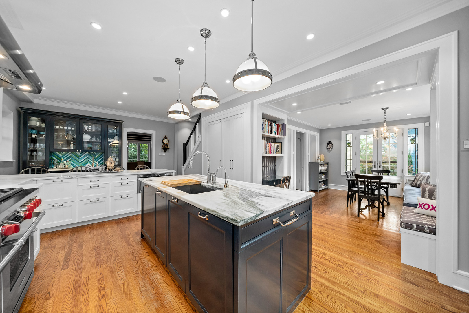732 Sheridan Road Evanston, IL 60202 - Photo 17 of 46 an open kitchen with a table and chairs in it
