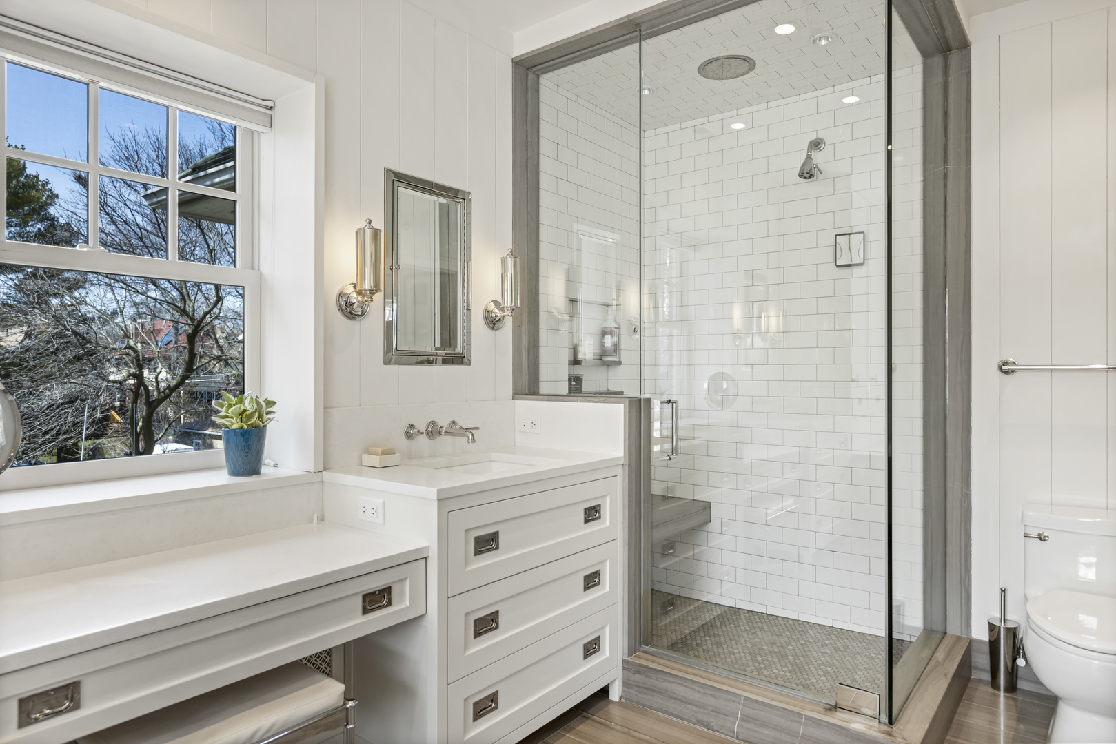 732 Sheridan Road Evanston, IL 60202 - Photo 26 of 46 a bathroom with a double vanity sink toilet and shower