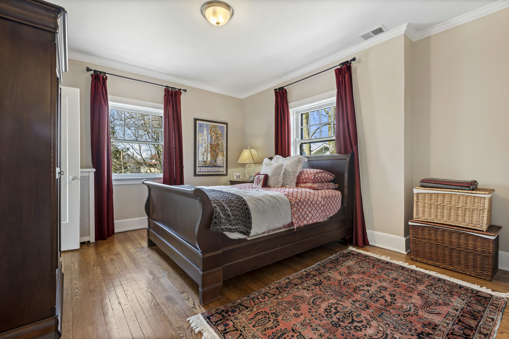 732 Sheridan Road Evanston, IL 60202 - Photo 28 of 46 a bedroom with a bed and wooden floor