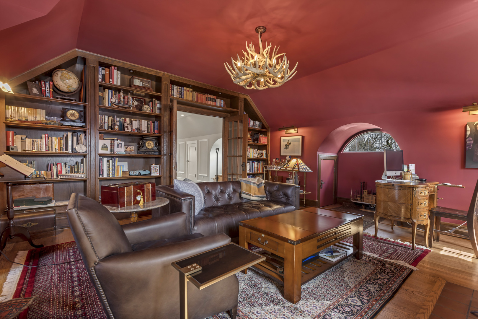 732 Sheridan Road Evanston, IL 60202 - Photo 38 of 46 a living room with furniture a rug and a bookshelf