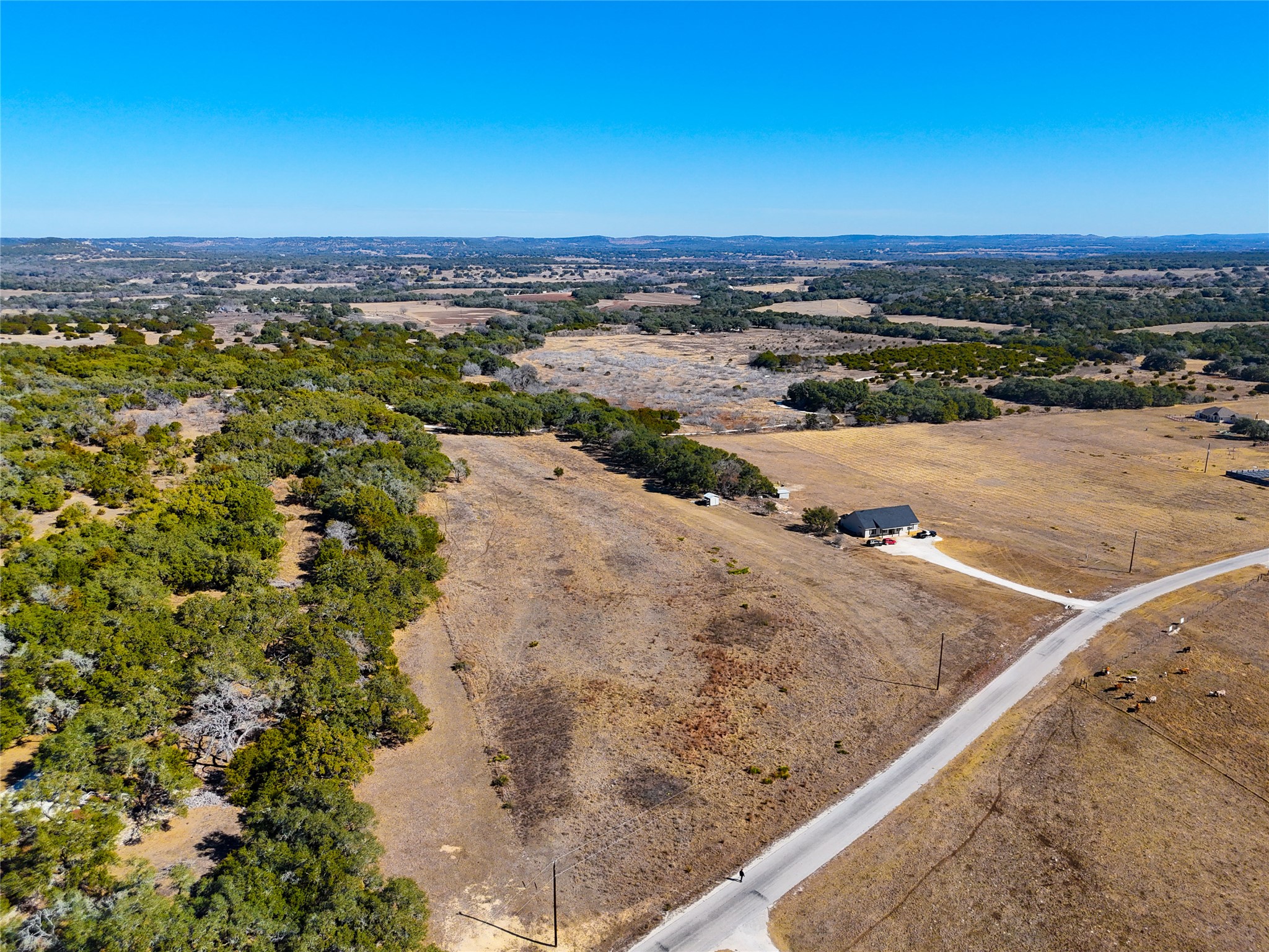 Tbd Lipan Apache Run Blanco, TX 78606 - Photo 7 of 26 Aerial view of property and surrounding area featuring rural landscape